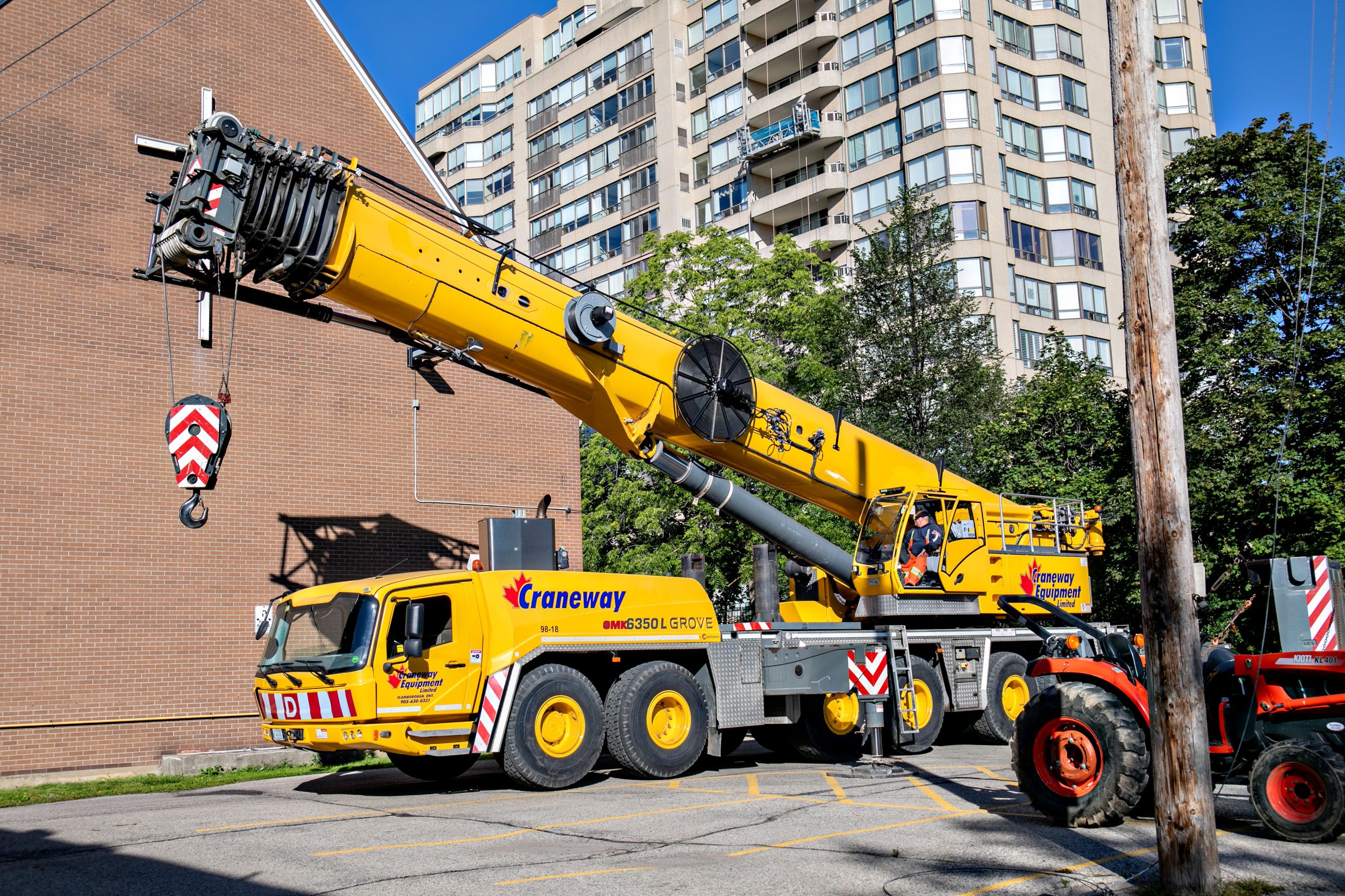 Crane and site equipment below a Waterpark Place tower.